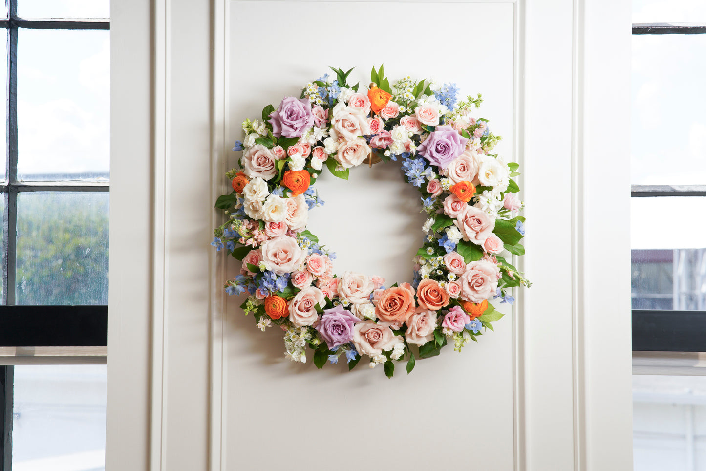 This wreath can be displayed on an easel at a funeral home, memorial service, place of worship, or post-service reception. We will hand-select the finest in-season flowers in your chosen color scheme, ensuring a truly one-of-a-kind design that captures the spirit of your loved one. Atlanta flower delivery