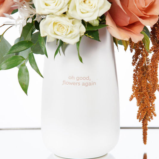 Classic white ceramic vase with ‘Oh Good, Flowers Again’ quote, ideal for reusing with fresh floral arrangements Atlanta Flower Delivery