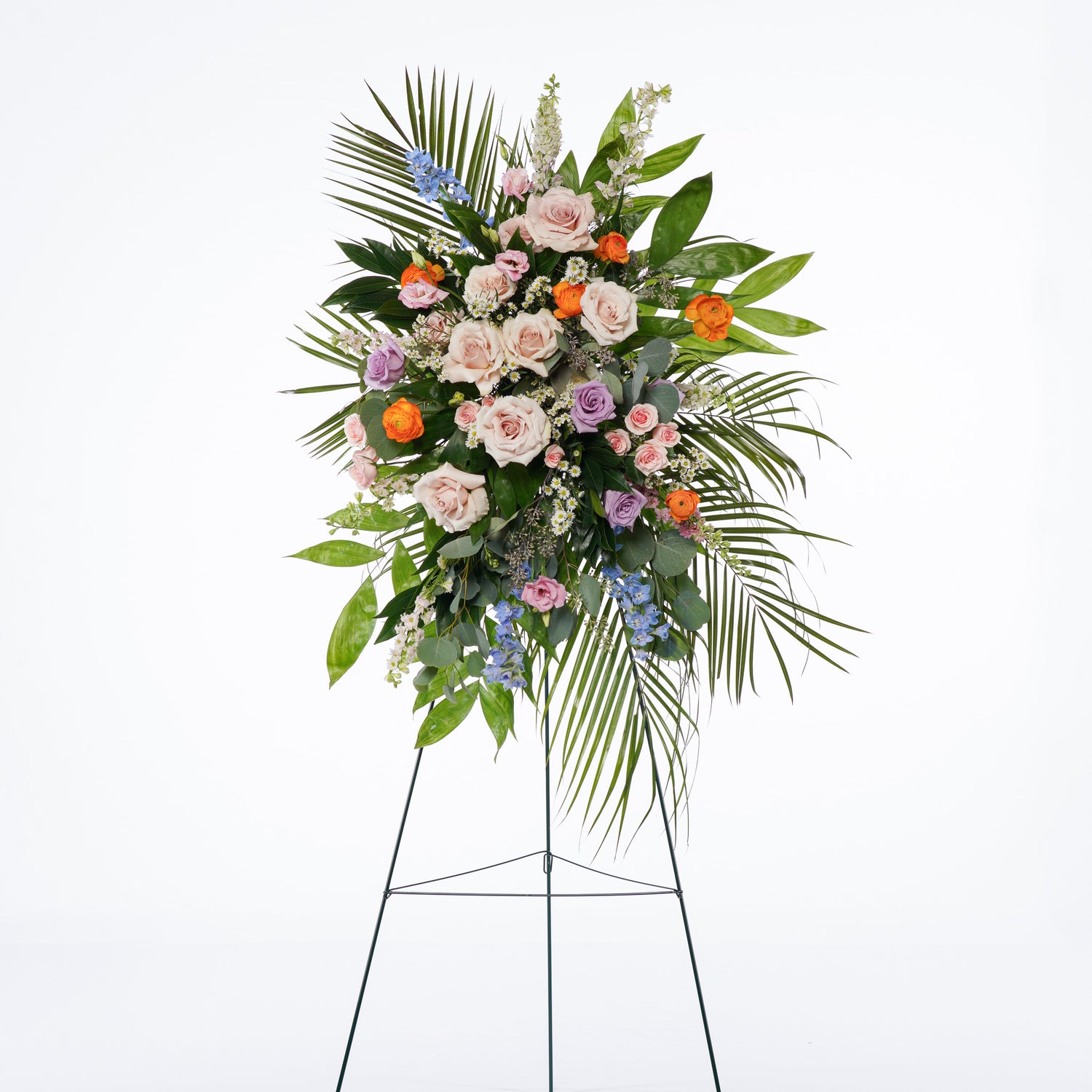 Perfect for placing on a casket or displayed on an easel at a funeral home, memorial service, place of worship, or celebration of life. We will choose the most beautiful seasonal flowers in your preferred color palette to design a unique and heartfelt arrangement Atlanta flower delivery